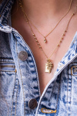 Kette Muschel in Gold